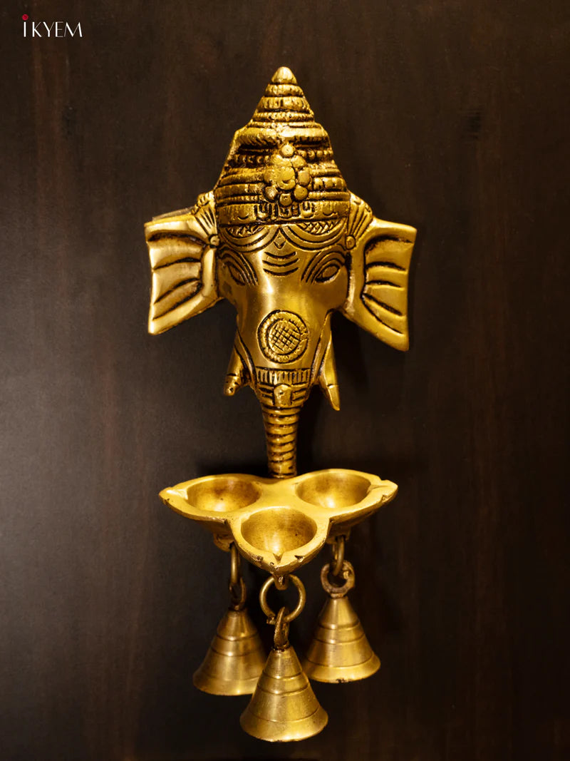 Brass Ganesha Face with 3-face Diya & Bells - KK26148