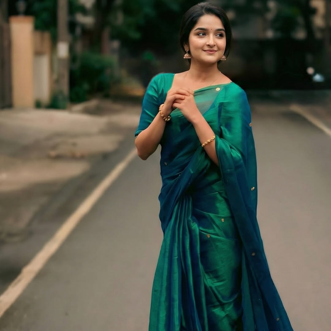 Premium Peacock Blue Raga Tissue Soft Silk Saree for Women | Elegant Gini Work | Rich Zari Border | Wedding & Festive Wear